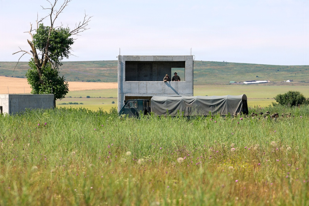 U.S. Marines conduct an M18 pistol range during Sea Breeze 26 in Romania