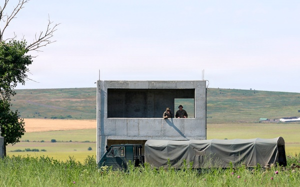 U.S. Marines conduct an M18 pistol range during Sea Breeze 26 in Romania