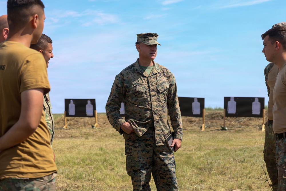 U.S. Marines conduct an M18 pistol range during Sea Breeze 26 in Romania