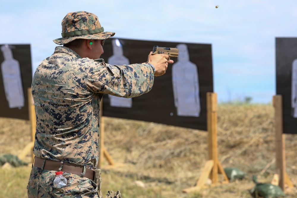 U.S. Marines conduct an M18 pistol range during Sea Breeze 26 in Romania