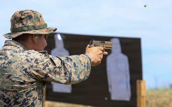 U.S. Marines conduct an M18 pistol range during Sea Breeze 26 in Romania