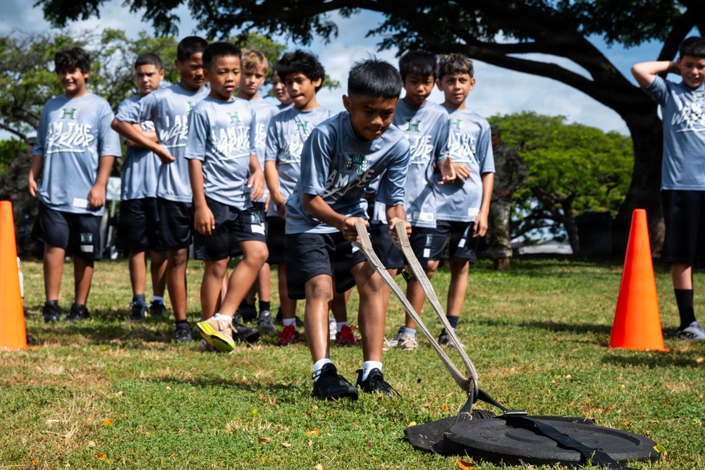 94th Army Air and Missile Defense Command Soldiers volunteer at the Youth Impact Program
