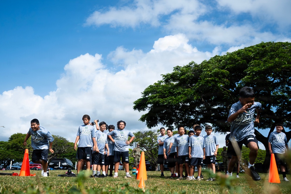 94th Army Air and Missile Defense Command Soldiers volunteer at the Youth Impact Program
