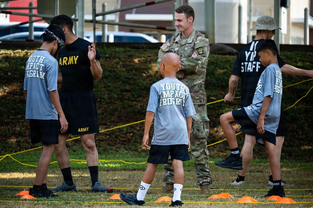 94th Army Air and Missile Defense Command Soldiers volunteer at the Youth Impact Program
