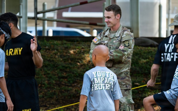 94th Army Air and Missile Defense Command Soldiers volunteer at the Youth Impact Program