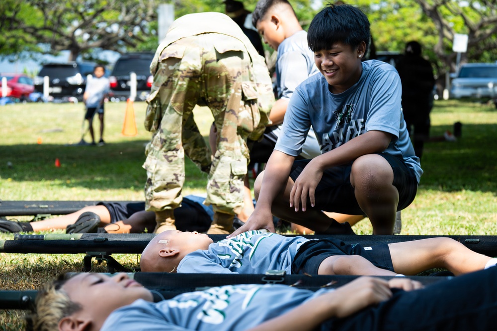 94th Army Air and Missile Defense Command Soldiers volunteer at the Youth Impact Program