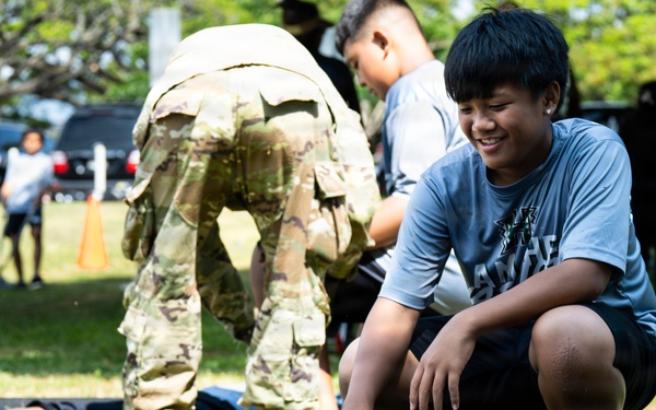 94th Army Air and Missile Defense Command Soldiers volunteer at the Youth Impact Program