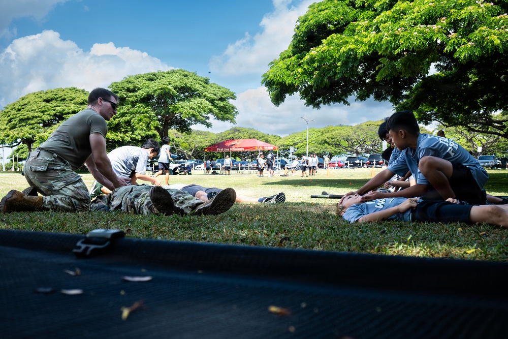 94th Army Air and Missile Defense Command Soldiers volunteer at the Youth Impact Program