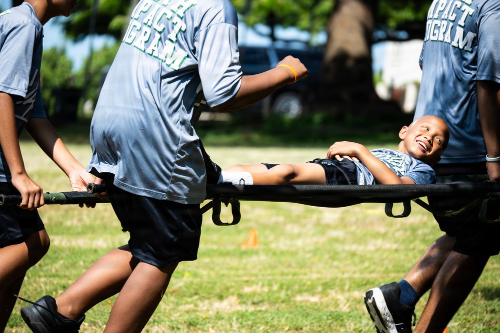 94th Army Air and Missile Defense Command Soldiers volunteer at the Youth Impact Program