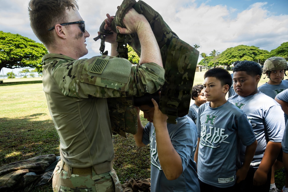 94th Army Air and Missile Defense Command Soldiers volunteer at the Youth Impact Program