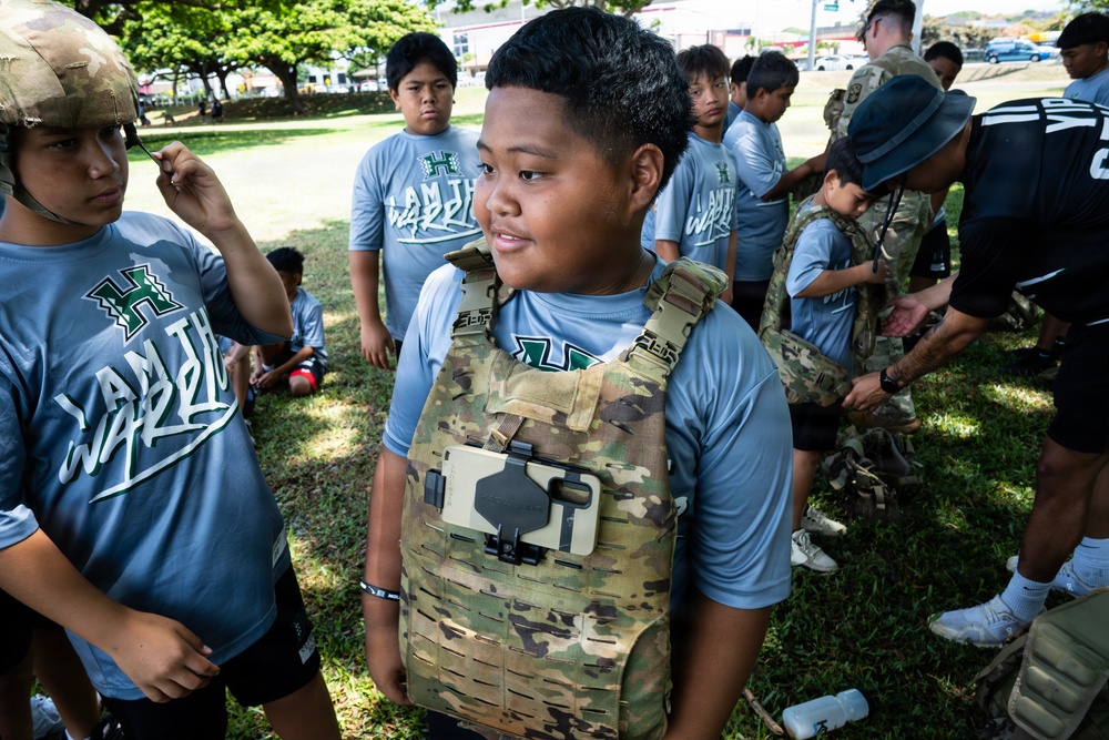 94th Army Air and Missile Defense Command Soldiers volunteer at the Youth Impact Program