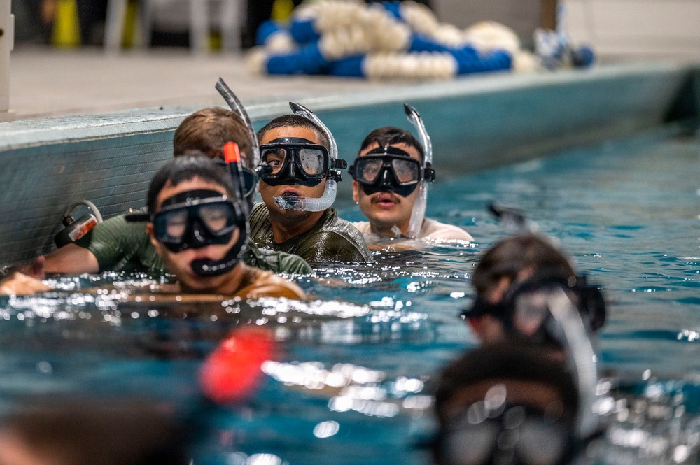 Navy students learn water survival