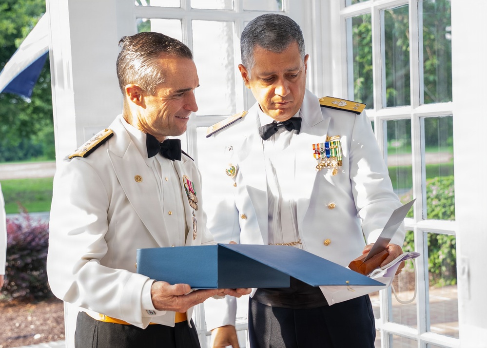 Vice Adm. Doug Perry hosts a dinner for allies and partners