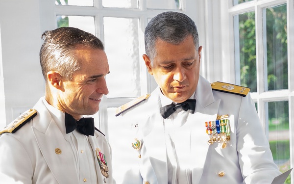 Vice Adm. Doug Perry hosts a dinner for allies and partners