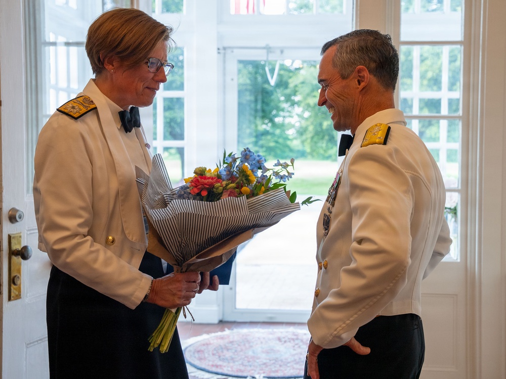 Vice Adm. Doug Perry hosts a dinner for allies and partners