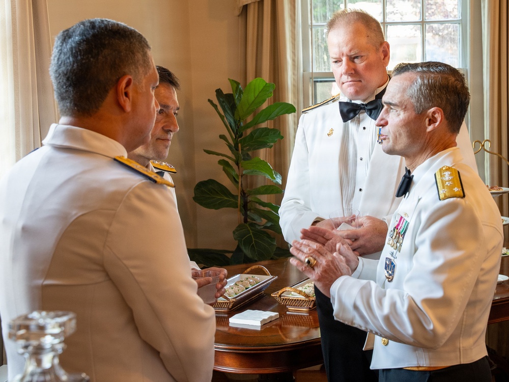 Vice Adm. Doug Perry hosts a dinner for allies and partners
