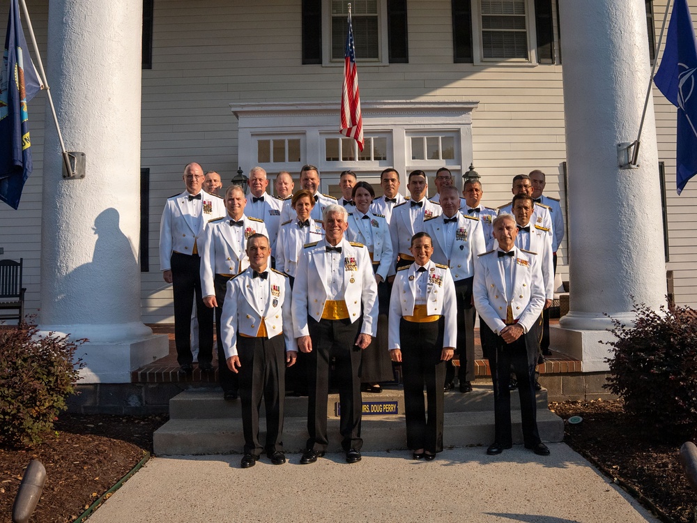 Vice Adm. Doug Perry hosts a dinner for allies and partners