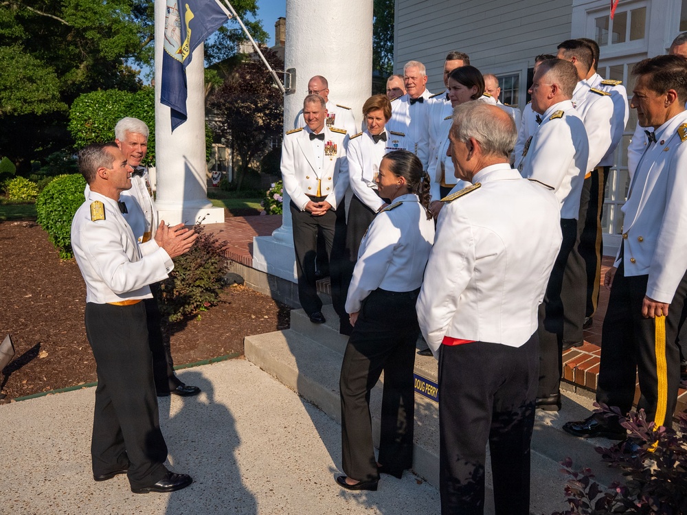 Vice Adm. Doug Perry hosts a dinner for allies and partners