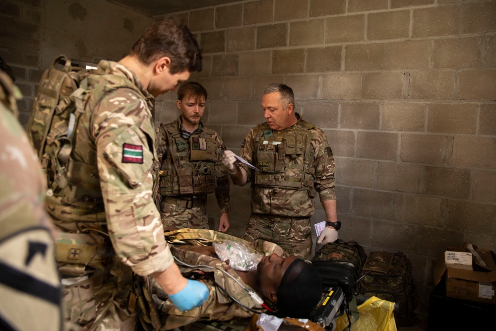 Day 2: U.S. and British Army medics train together during close-quarters battle drills
