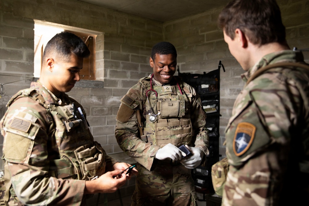 Day 2: U.S. and British Army medics train together during close-quarters battle drills