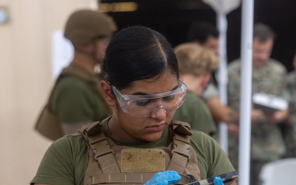 1st MLG Sailors use Battlefield Assisted Trauma Documentation Kits for Valkyrie course