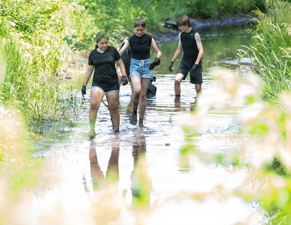 Hanscom Students help clean Shawsheen River