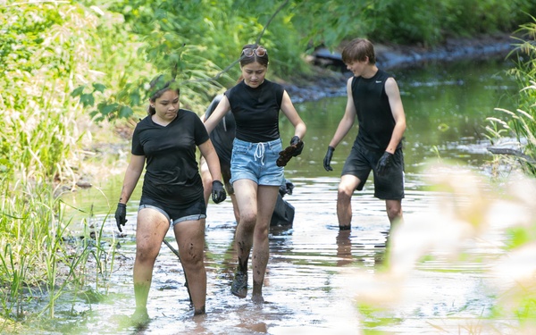 Hanscom Students help clean Shawsheen River