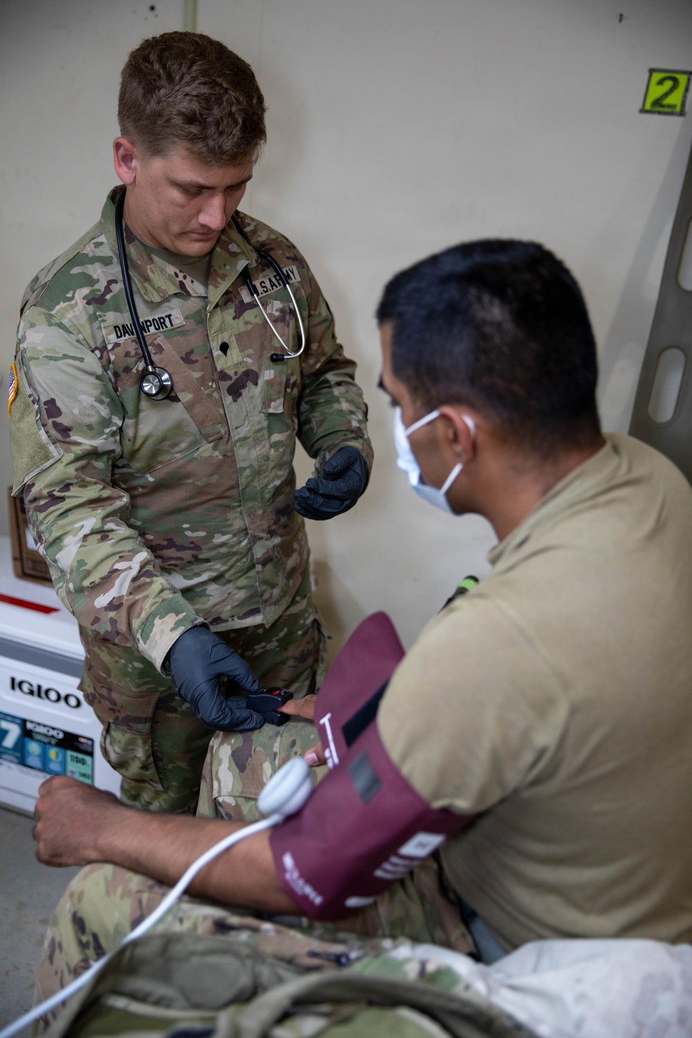 Army Reserve Medical Personnel Conduct Patient Assessments During Operation Sentinel Justice