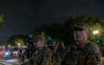 Mississippi National Guardsmen patrol during UFC Freedom 250 in Washington, D.C.