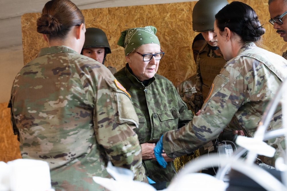 Soldiers treat simulated casualty
