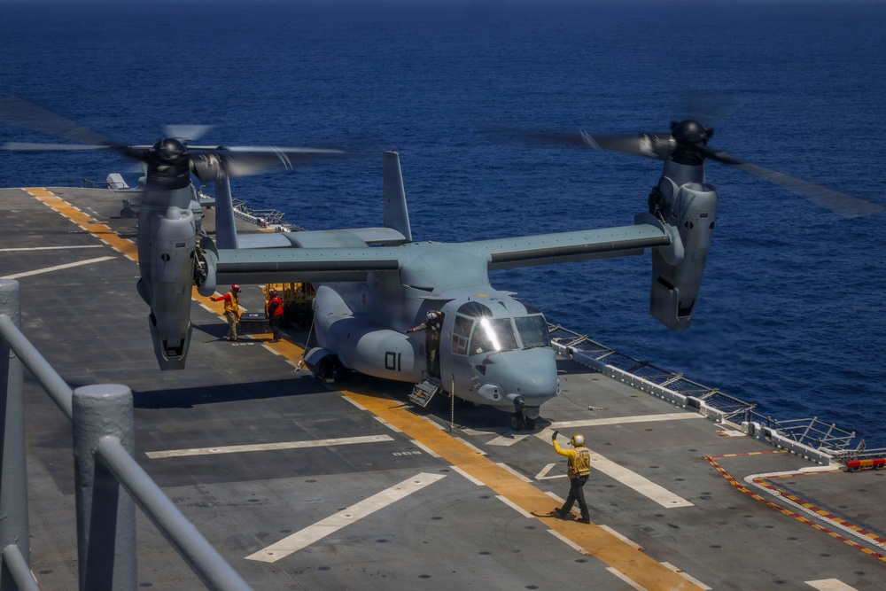 U.S. Marines and Sailors conduct flight operations on USS Essex