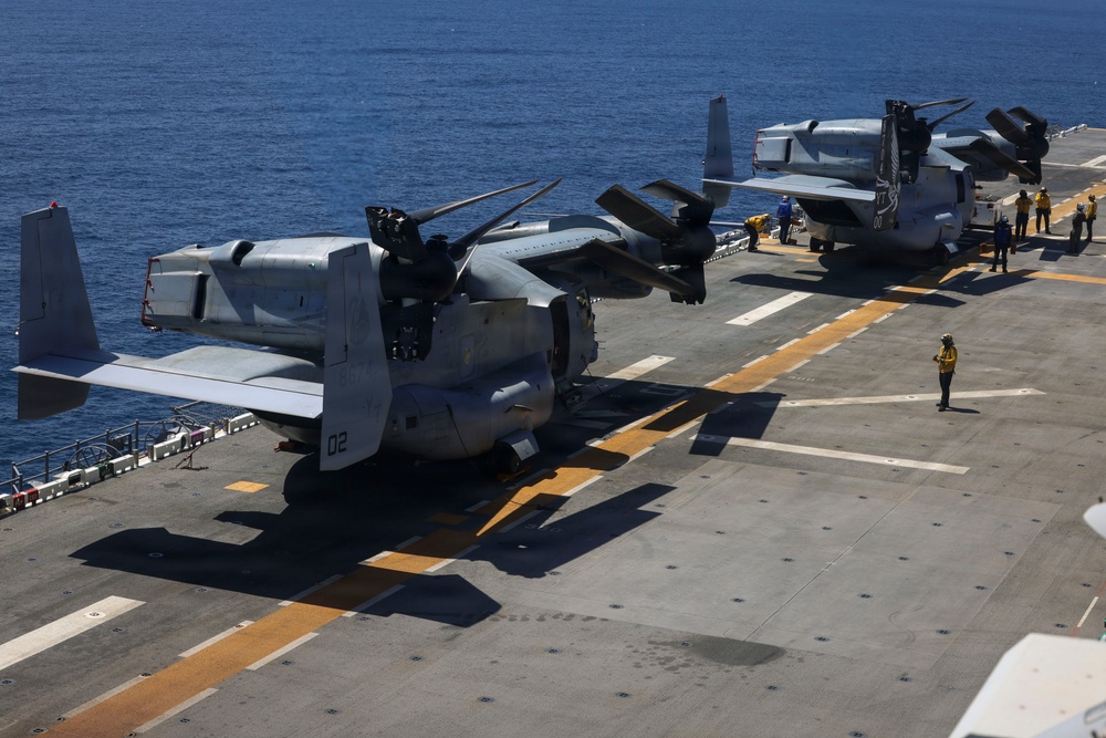 U.S. Marines and Sailors conduct flight operations on USS Essex