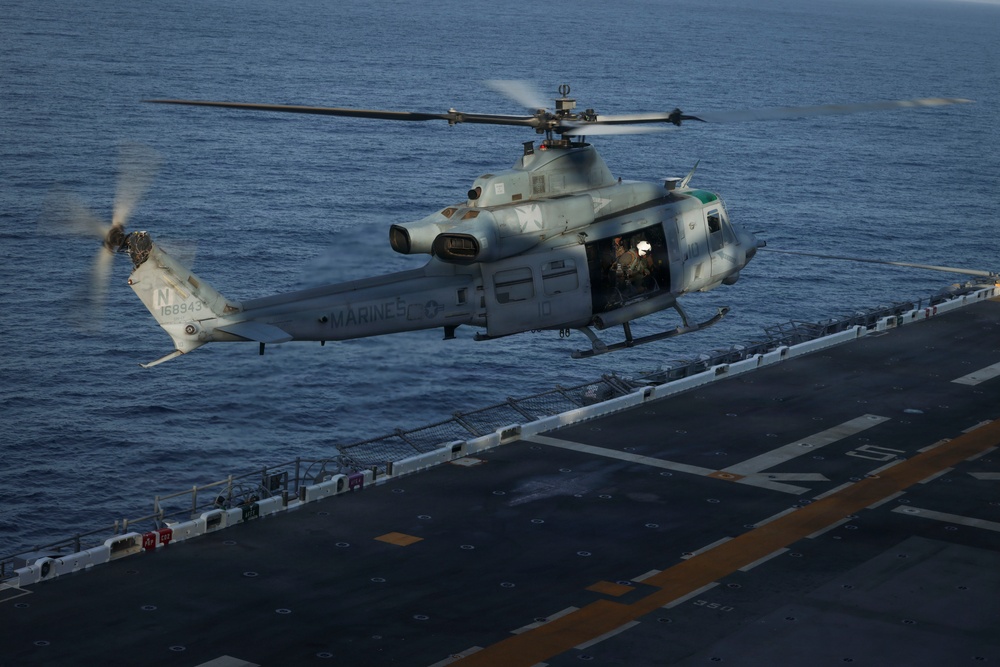 U.S. Marines and Sailors conduct flight operations on USS Essex