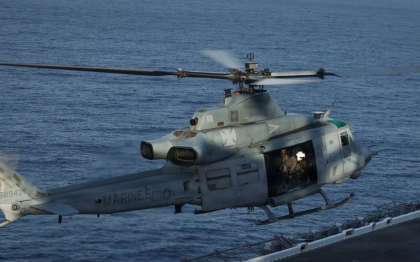 U.S. Marines and Sailors conduct flight operations on USS Essex