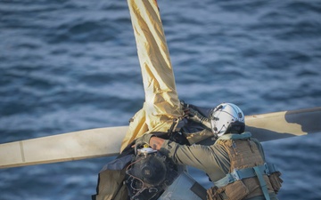 U.S. Marines and Sailors conduct flight operations on USS Essex