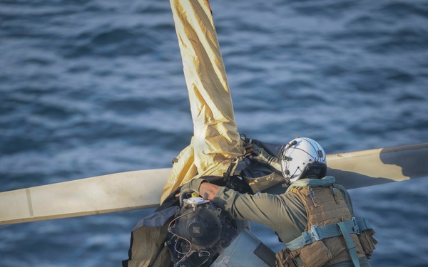 U.S. Marines and Sailors conduct flight operations on USS Essex
