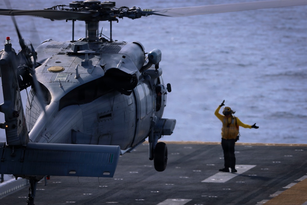 U.S. Marines and Sailors conduct flight operations on USS Essex
