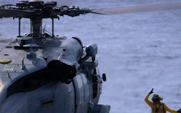 U.S. Marines and Sailors conduct flight operations on USS Essex
