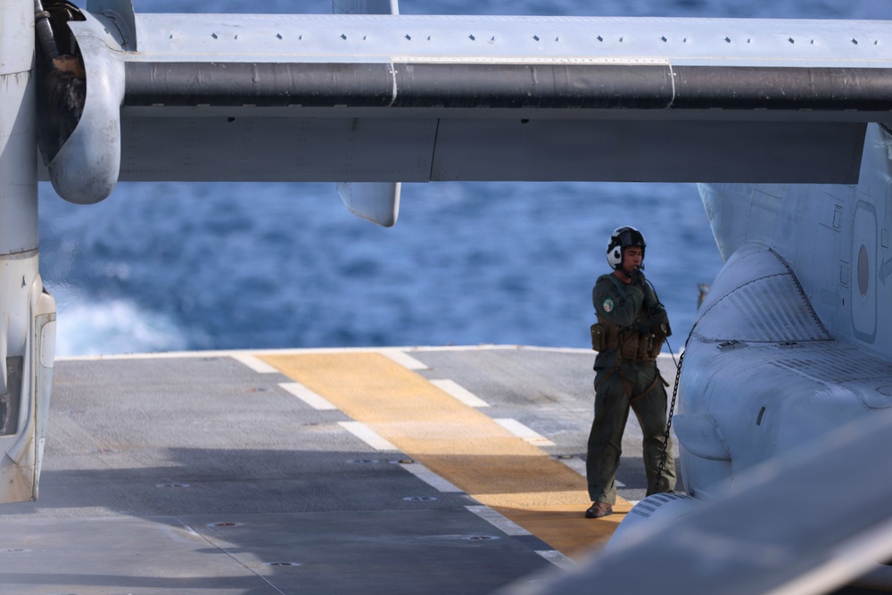 U.S. Marines and Sailors conduct flight operations on USS Essex