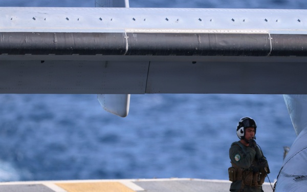U.S. Marines and Sailors conduct flight operations on USS Essex