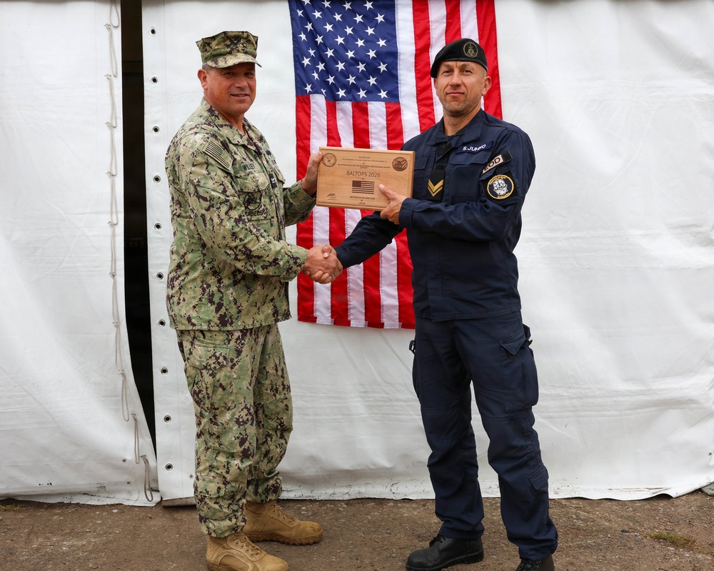 22 NCR Commodore Presents Award during BALTOPS 2026
