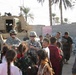 U.S. Army Spc. Selena Holleman with the 163rd Area Support Medical Company, during a medical mission for the civilian population in Baqubah, Iraq, 2010.