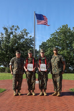 Never too far apart: Identical twins get promoted to the rank of Corporal