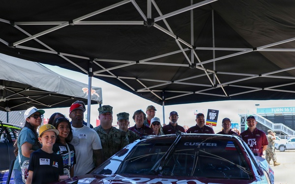 Helicopter Strike Fighter Squadron 4 tours NASCAR's Haas Factory Team Hauler Garage