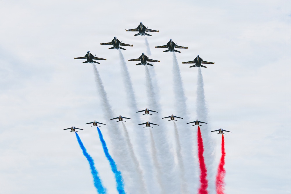 Blue Angels fly in formation with Patrouille Acrobatique de France