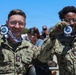 Sailors compete in the NASCAR Pit Crew Challenge