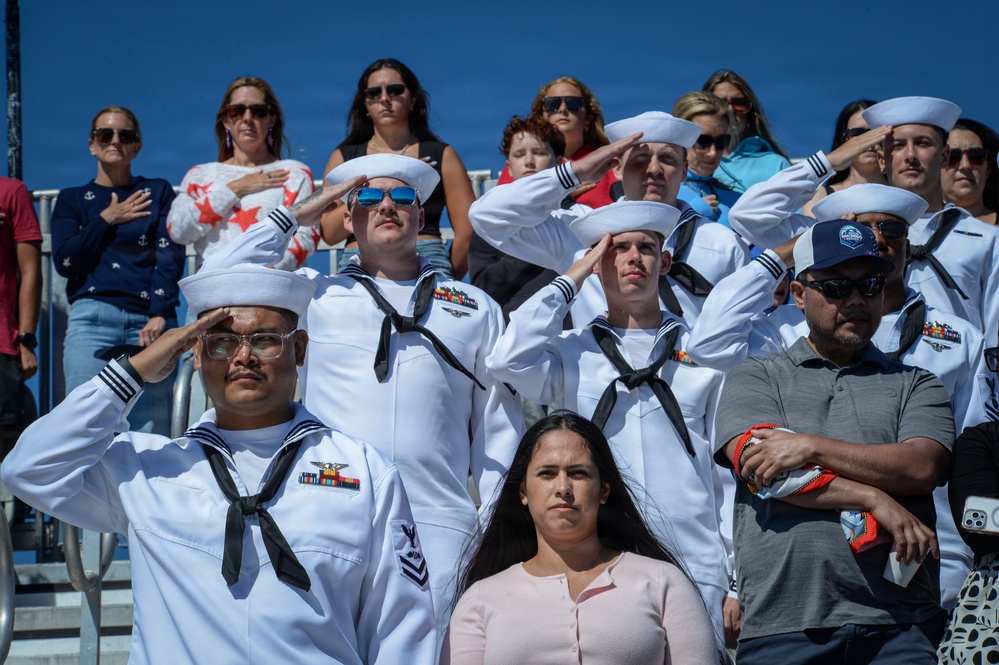 USS Carl Vinson (CVN 70) Sailors observe the national anthem during NASCAR San Diego Weekend