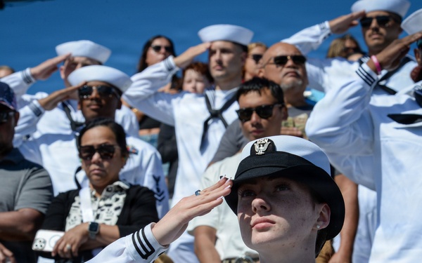 USS Carl Vinson (CVN 70) Sailors render salutes during NASCAR San Diego Weekend