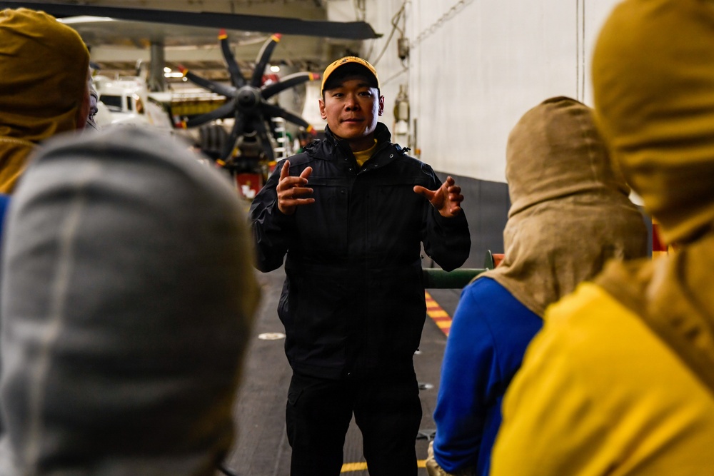 U.S. Navy Sailors Participate in a General Quarters Drill