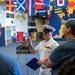 Sailor gives a tour aboard Wasp-class amphibious assault ship USS Iwo Jima (LHD 7)